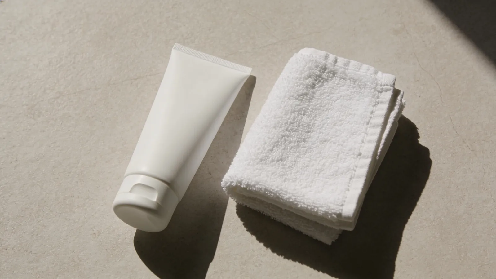 Plain gel tube and white face towel