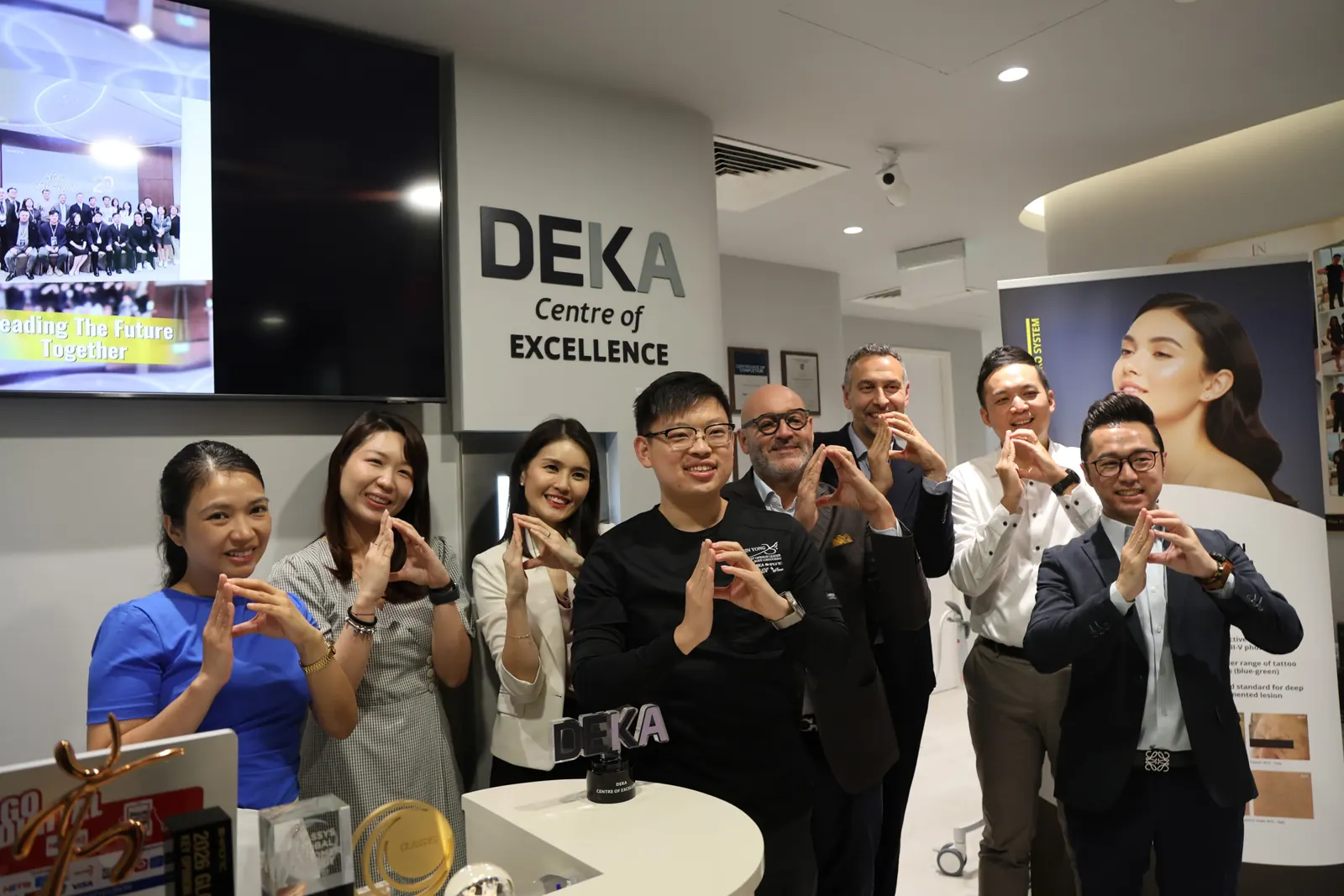 Under the DEKA Centre of Excellence signage