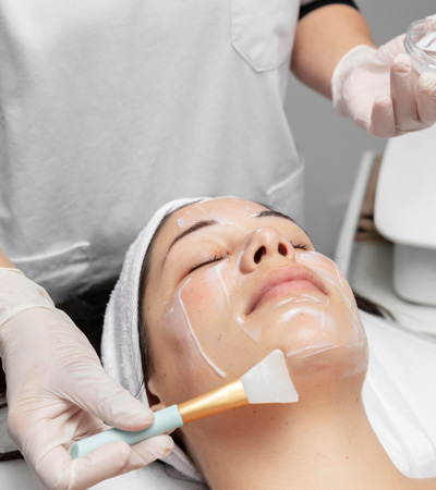 receiving manual facial massage from skinrev